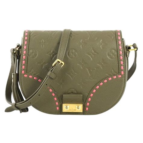 Louis Vuitton Junot Handbag Monogram Empreinte Leather.